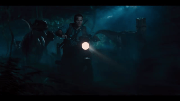 Chris Pratt with velociraptors